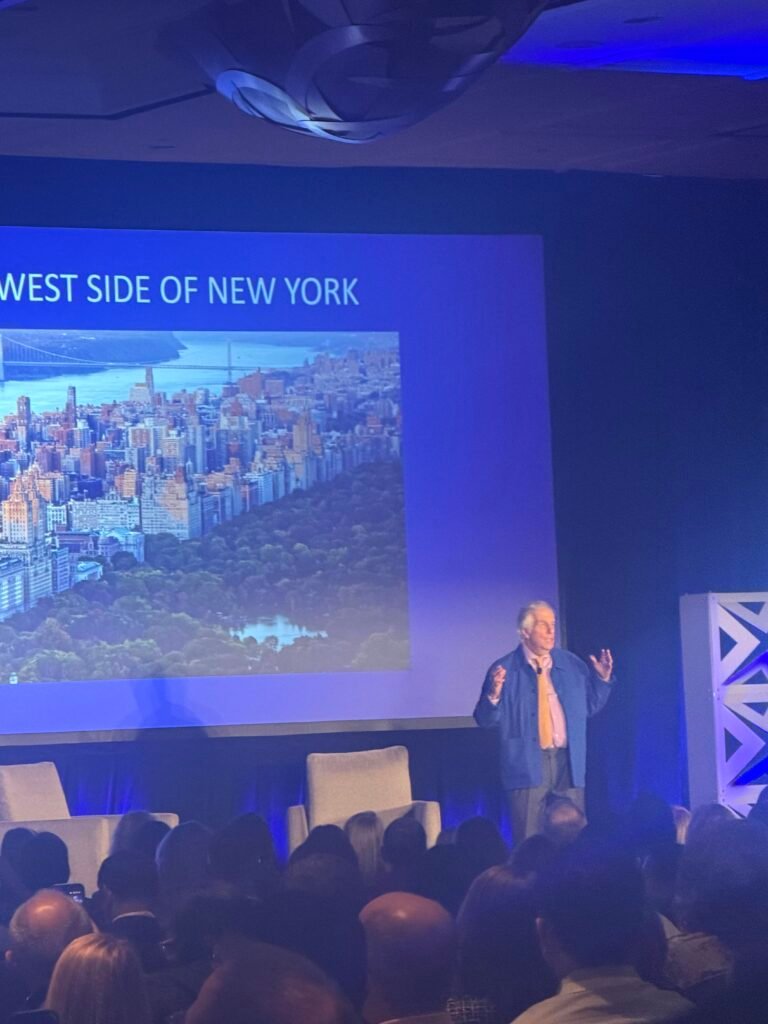 Actor and keynote speaker Henry Winkler addressing attendees onstage at the HCAOA National Home Care Conference 2026 in Orlando, Florida.